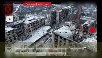 Купянск. На кадрах видно здание бывшей гостиницы и рядом стоящих домов